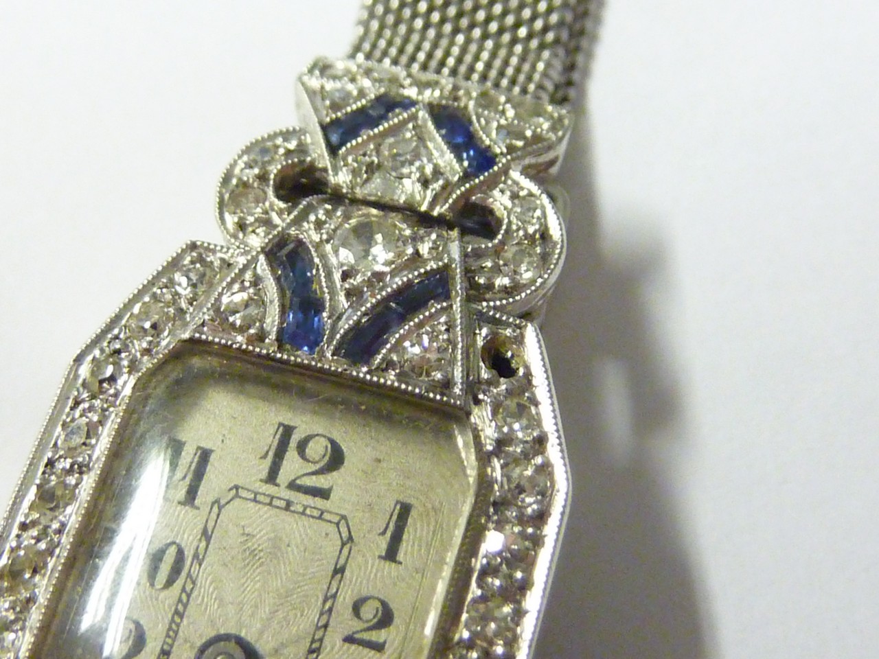 A BOXED LADIES PLATINUM ART DECO COCKTAIL WRISTWATCH, diamond and sapphire set octagonal bezel and - Image 2 of 3