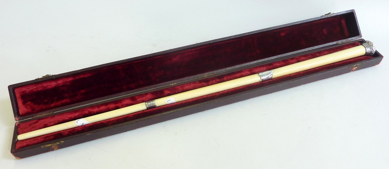 A CASED ANTIQUE IVORY CONDUCTOR’S BATON, late 19th/early 20th Century, white metal mounts, length - Image 2 of 2