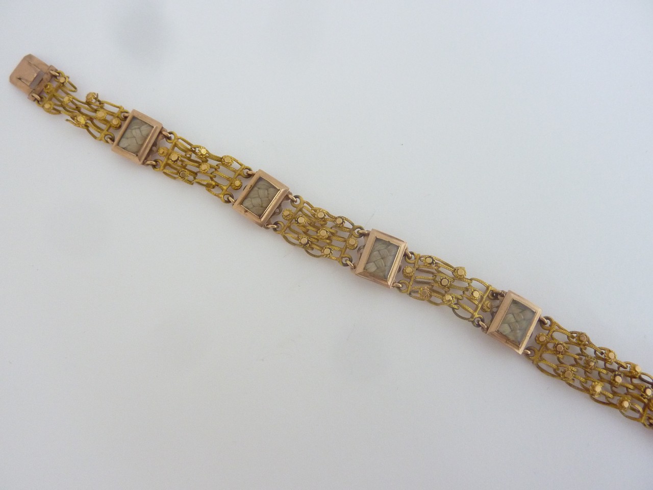 A VICTORIAN MEMORIAL BRACELET, each rectangular shape panel with blonde woven hair, each panel has a - Image 3 of 7