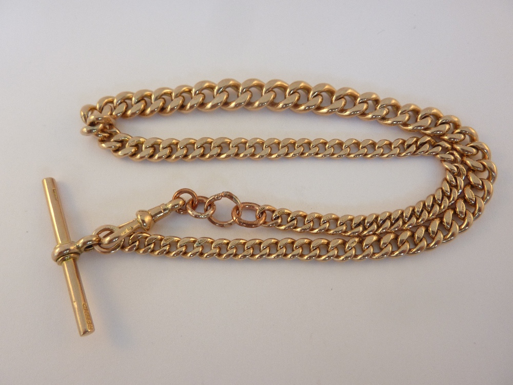 AN EARLY VICTORIAN GRADUATED ALBERT ROSE GOLD CHAIN, the graduated links to the 9ct gold T-bar,