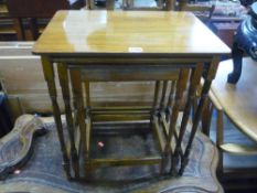 AN OAK NEST OF THREE TABLES