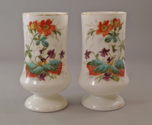 A pair of milk glass vases, 19th century, enamelled with flowers, 25.5cm. high