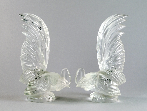 Lalique, two models of perching cockerels, engraved marks Lalique France to base, 21cm high, (2)