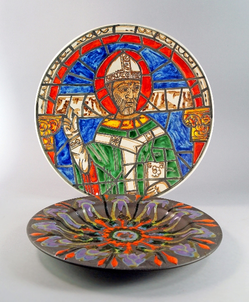 A Poole Pottery charger designed by Christine Tate, the stained glass depicting half length portrait