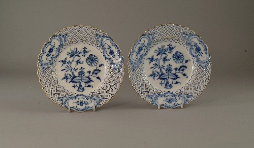 A pair of blue union Meissen plates, late 19th/early 20th century, with gilt lined reticulated