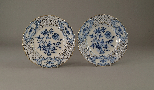 A pair of blue union Meissen plates, late 19th/ early 20th century, with gilt lined reticulated