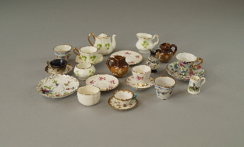 A collection of miniature pottery and porcelain useful wares, 20th century, to comprise an Erin