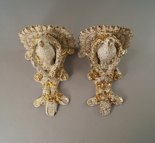 A pair of Continental etagieres, 20th century, modelled with a bird on branch with foliage, with