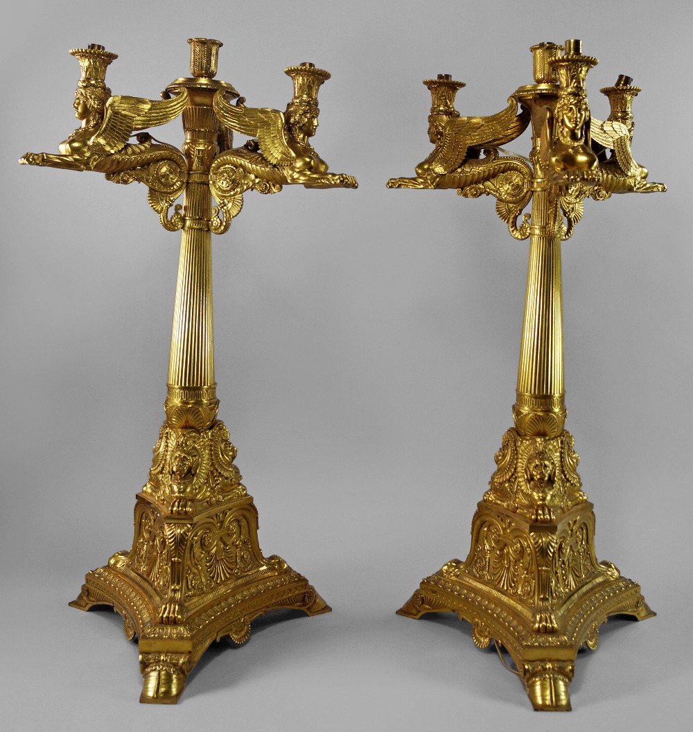 A pair of large French Empire revival ormolu four light candelabra, late 19th/early 20th century,