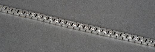 An 18 ct white gold and diamond necklace
44 cms long.   CONDITION REPORTS:  Overall good, some