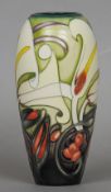 A limited edition Moorcroft Collector's Club vase, Arum Lily designed by Emma Bossons
Variously