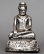 A 19th century unmarked white metal clad model of Buddha
Typically modelled in the lotus