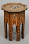 A 19th century North African or Middle Eastern mother-of-pearl inlaid octagonal side table
Of