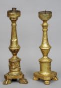 A pair of 19th century Continental giltwood pricket sticks
Each of typical form with a triangular