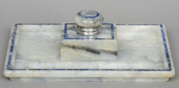 An Art Deco silver mounted lapis lazuli inset marble desk stand, hallmarked London 1919, maker's