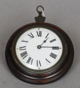 A 19th century mahogany cased Sedan clock
The white enamel dial with Roman numerals, the interior