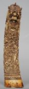 An Eastern bone carving
Decorated with various figures and mythical characters.  26 cms high.