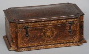 A 19th century gilt tooled leather casket
Of canted rectangular form with a domed lid.  34 cms wide.