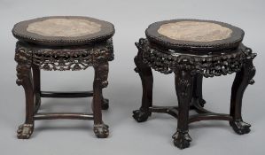 A pair of 19th century Chinese marble inset carved hardwood side tables
Each shaped bead moulded top