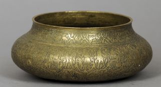 A well engraved 19th century Indian brass bowl
Decorated with various figures and animals.  15 cms