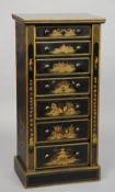 A chinoiserie lacquered Victorian Wellington chest
Decorated in black and gold with red highlights.