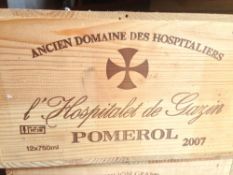 L'Hospitalet de Gazin Pommerol 2007
Twelve bottles in old wooden case.  (12)   CONDITION REPORTS: