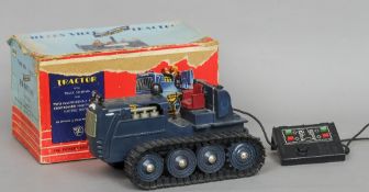 A Vickers Vigor 1/16th scale remote controlled track laying tractor
Housed in its original box.  The