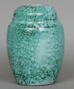 A Felix Gete Art Deco vase
The urn form cylindrical body decorated in mottled turquoise tones.  19.5