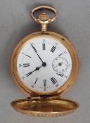 A Continental gold cased full hunter lady's pocket watch
The white enamel dial with Roman and Arabic