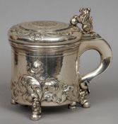 A 20th century Swedish silver tankard, hallmarked Stockholm 1947, maker's mark of C.G.H
The coin