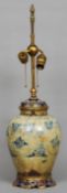 An early Middle Eastern underglaze blue painted baluster vase
With later gilt metal, cloisonne and