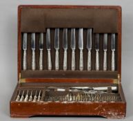A 20th century canteen of silver cutlery, hallmarked London 1974, maker's mark of Asprey & Co.
Of