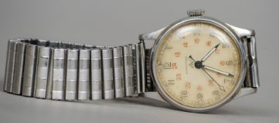 A Longines military wristwatch 
The white dial with Arabic numerals, housed in a base metal case.