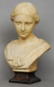 A late 19th century plaster bust
The female figure with faux marble decoration, standing on a