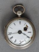 A Continental white metal cased pocket watch
Of small proportions, the white enamel dial with