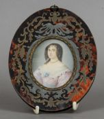 A 19th century miniature on ivory depicting a young lady
Her hair in ringlets, wearing a suite of