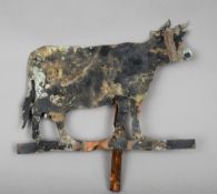 A painted copper weather vane figure
Formed as a cow.  33 cms wide.   CONDITION REPORTS:  Split to