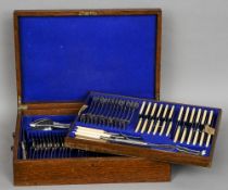 A 19th century composite King's Husk pattern silver canteen
Comprising: twelve table forks, twelve