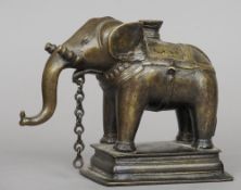 An Indian bronze model of an elephant, possibly 17th century
Probably an oil lamp base.  19 cms