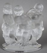 A Lalique figural group
Formed as naked putto holding vines.  19.5 cms high.   CONDITION REPORTS:
