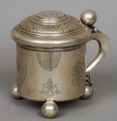 A Swedish hallmarked silver lidded tankard, hallmarked for 1910
Of typical form with coin inset