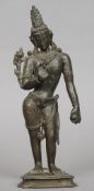 A 19th century Indian figure of a male deity
Modelled standing on a geometric stepped plinth