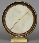 An early 20th century Art Deco mantel clock
Of circular form, the dial with Roman numerals inscribed
