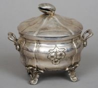A 19th century white metal sucrier and cover, possibly Maltese
The cover with clam shell finial, the