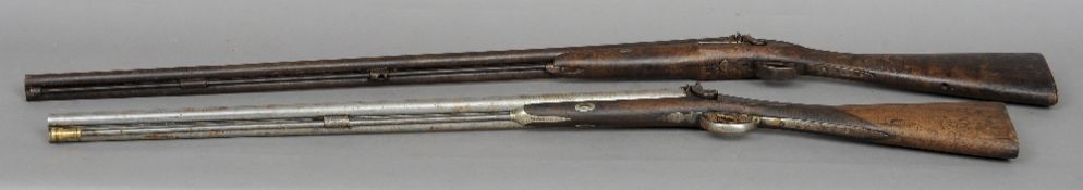 Two muzzle loading percussion cap double barrel shot guns
The largest 134 cms long.  (2)