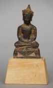 An early antique cast iron model of Buddha
Typically modelled seated in the lotus position, with