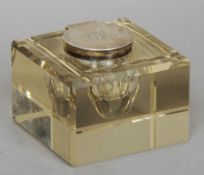 A George V silver mounted cut glass inkwell, hallmarked Birmingham 1911, maker's mark of JG & S