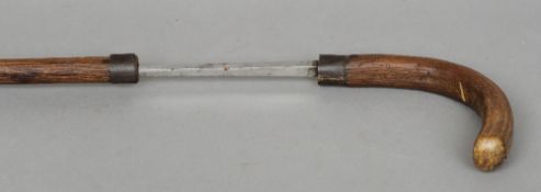 A 19th century rustic sword stick
With diamond section blade.  95.5 cms long.   CONDITION