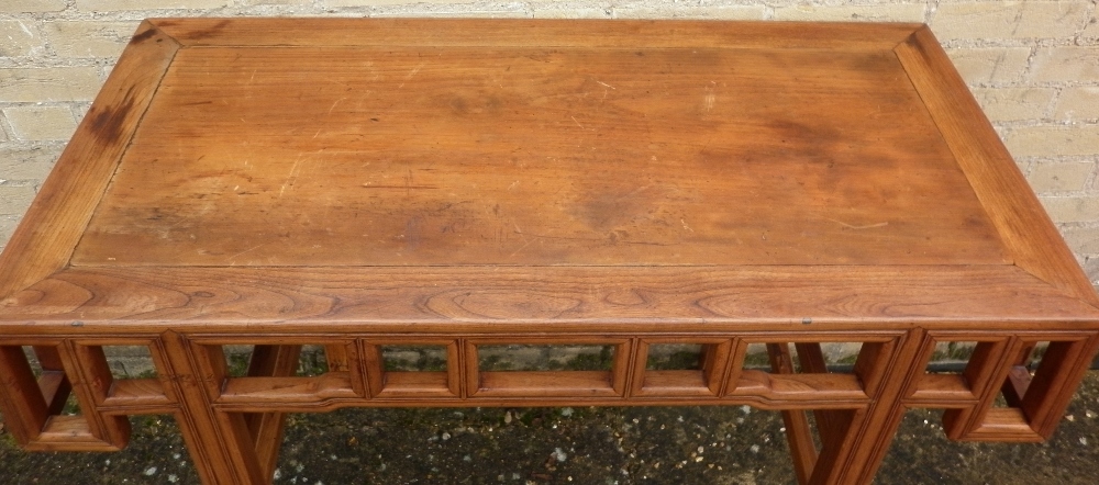 A 19th century Chinese elm altar table
The cleated rectangular top above a frieze of pierced - Image 3 of 4