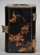 An early 20th century Japanese lacquered box
Of canted rectangular form, decorated with birds